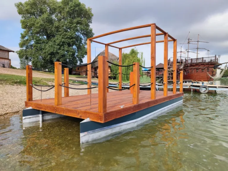 Catamaran 5.1 x 2.5 m. Catamaran floats are made of 3 mm thick aluminum sheet. An aluminum structure, made of jackl profile, is welded to the floats, on which there is a deck made of red spruce.
