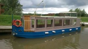 Ship – Gallery, Bata channel Skalica (electric ship). The gallery was comprehensively handled at our company. In addition to implementation, we also dealt with the design work itself, which was adapted to the customer's needs.